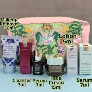Estee Lauder Skincare Collection with Pink and Green Bag